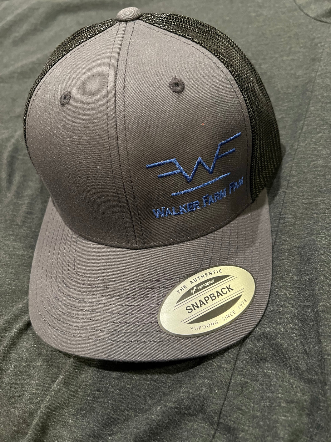 WFF Brand Hat dark gray bill / front and blue writing, black back